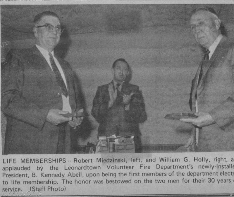 1971: The installation banquet saw the recognition of our first two lifetime members for over 30 years of service.  Wm. G Holley and Robert Miedzinski were presented with their lifetime membership. President Kennedy Abell looks on.